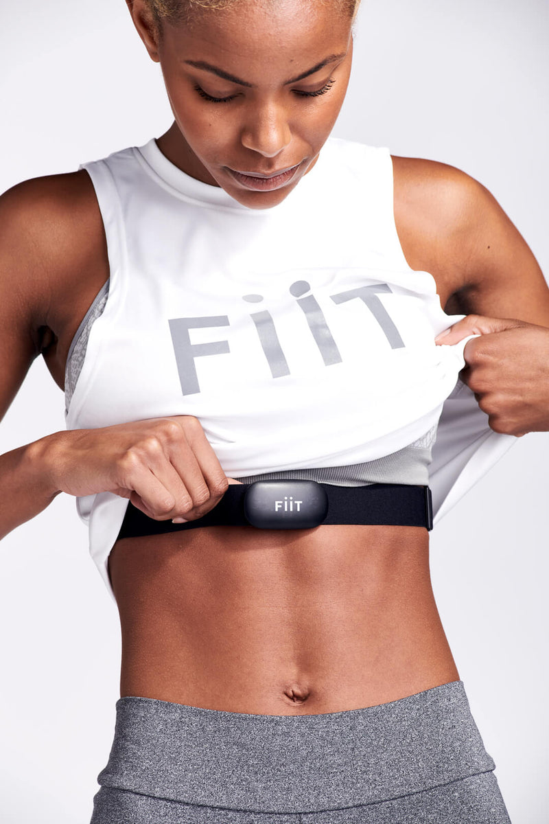 woman wearing  Fiit heart rate and exercise monitor
